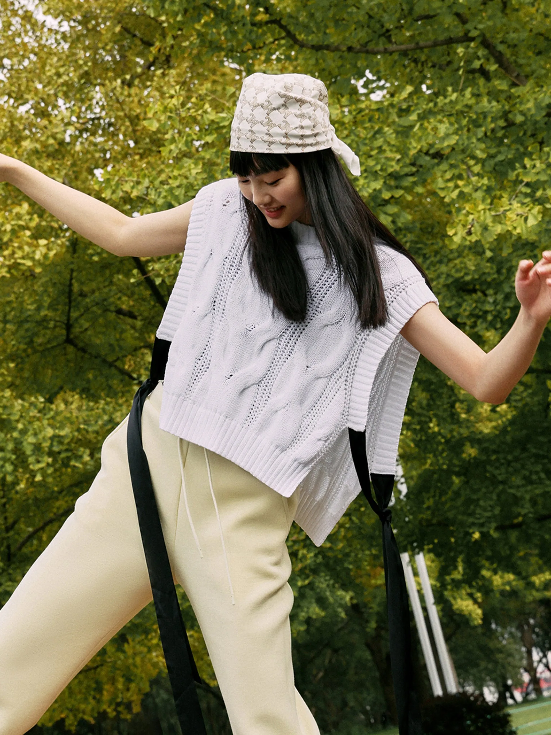 Openwork Tied Sleeveless Knit Top