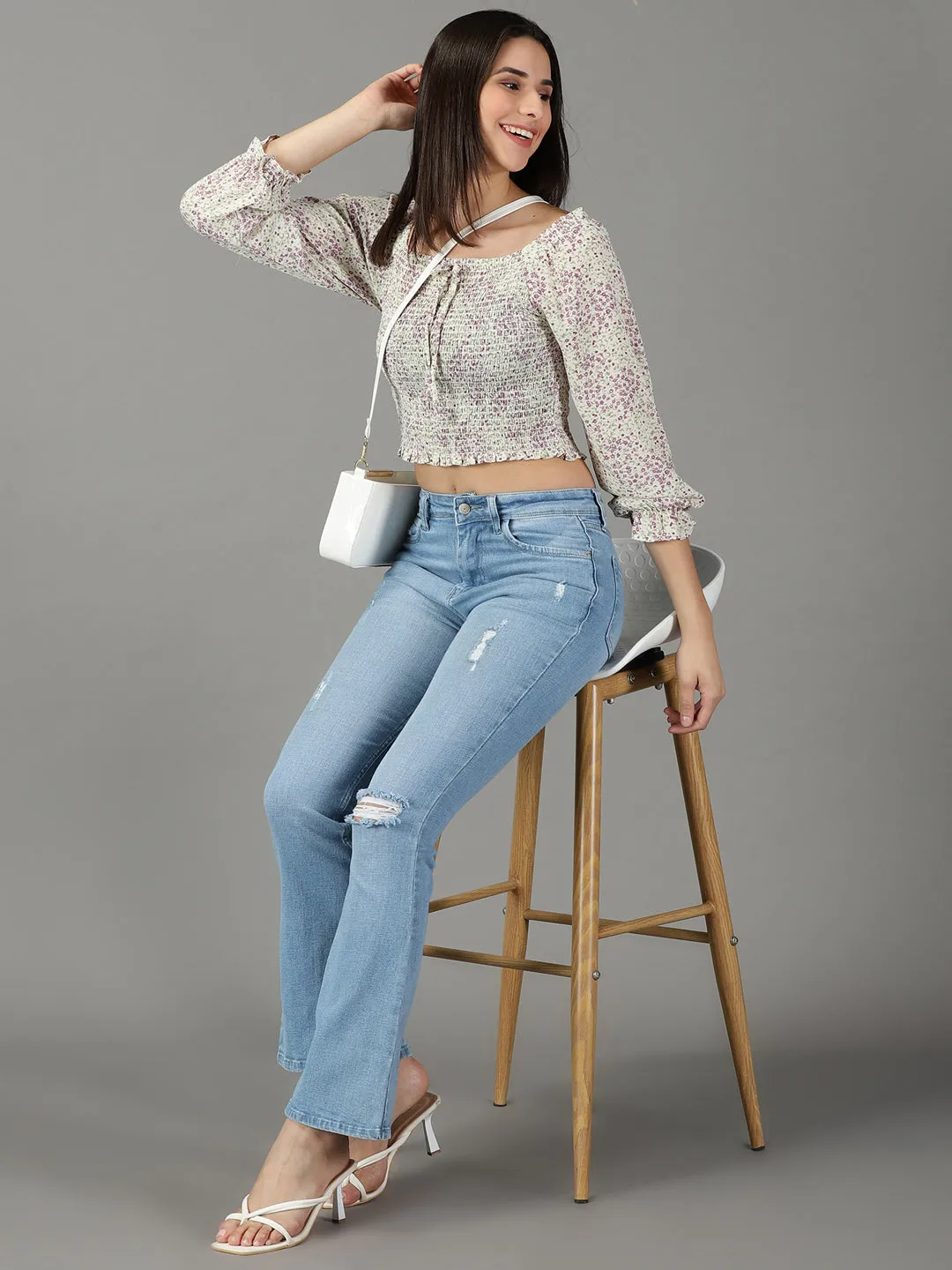Women Blue Bootcut High-Rise Mildly Distressed Light Fade Cotton Stretchable Jeans